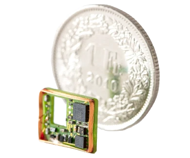 Image comparison of a very small SMD-equipped PCBA next to a 1 CHF coin to illustrate its compactness and precision. The PCBA is fully isolated and protected by a Parylene coating, making it ideal for use in medical technology, including implantable applications.